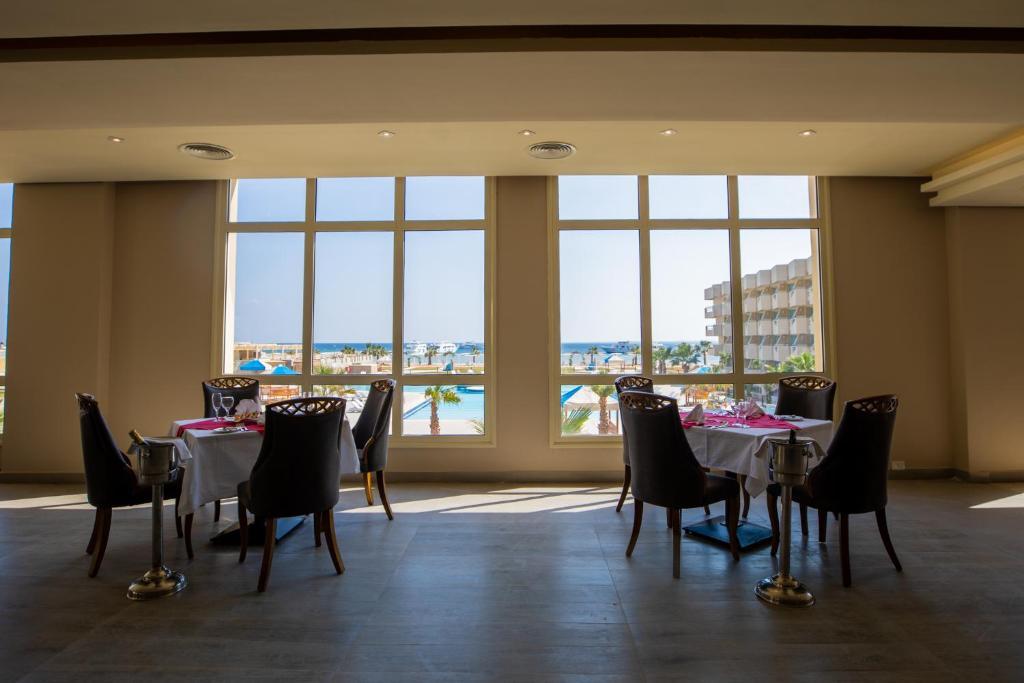 Aqua mondo хургада египет. Отель Aqua mondo Abu. Каираба Аква Мондо Резорт. Aqua mondo Abu Soma Resort 5*. Aqua mondo Египет.