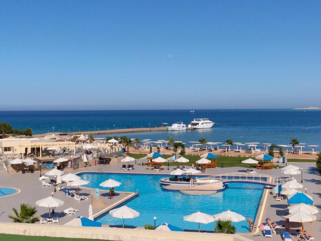 Kairaba aqua mondo abu soma resort 5. Отель Aqua mondo Abu Soma Resort 5*. Aqua mondo Хургада 5. Аква Мондо Абу сома Резорт 5 Хургада. Kairaba Aqua mondo Resort 5 Египет Хургада.